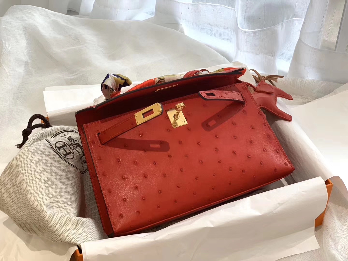 HERMES Q5国旗红 金扣 鸵鸟皮 22 Kelly pochette一代 手包晚宴包/配上猪鼻子链可当小挎包