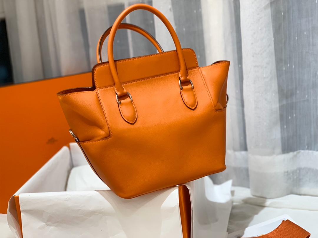 HERMES 20 toolbox 牛奶盒 工具盒 一款中性有趣的包 中间采用轻便的金属旋转设计 无需拉链 简单方便  巨能装 swift   93 橙色 银扣